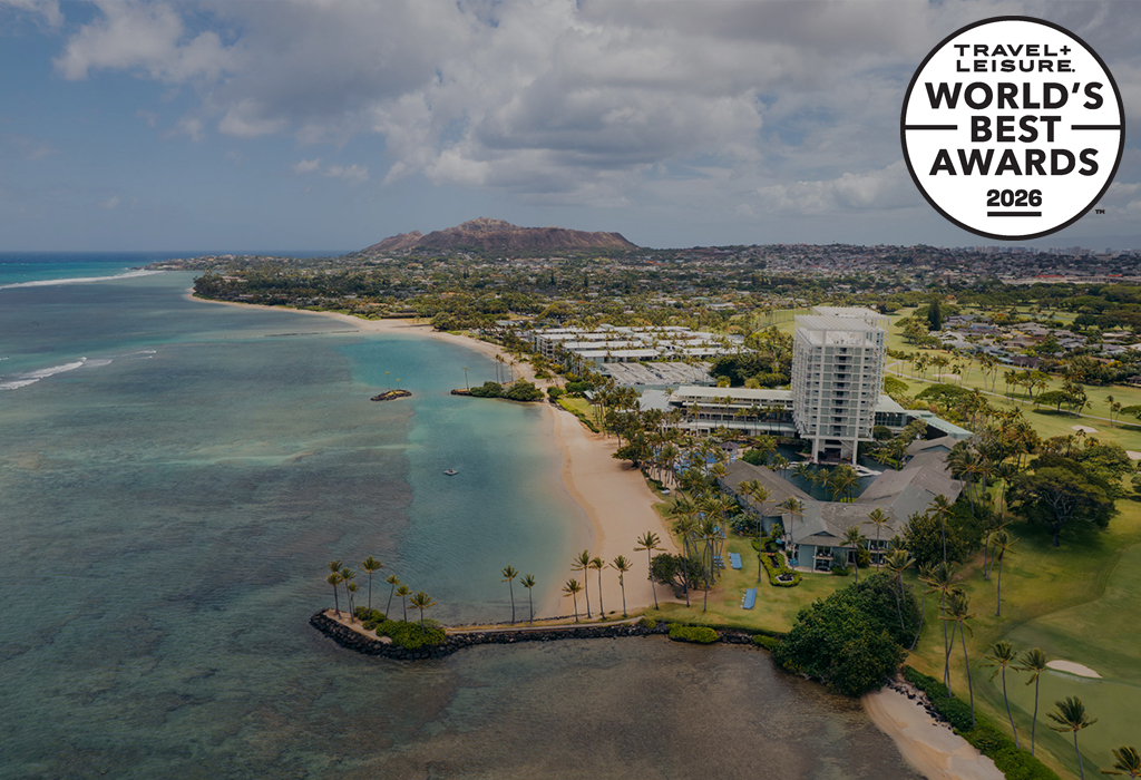 drone picture of Kahala resort with Travel + Leisure award logo