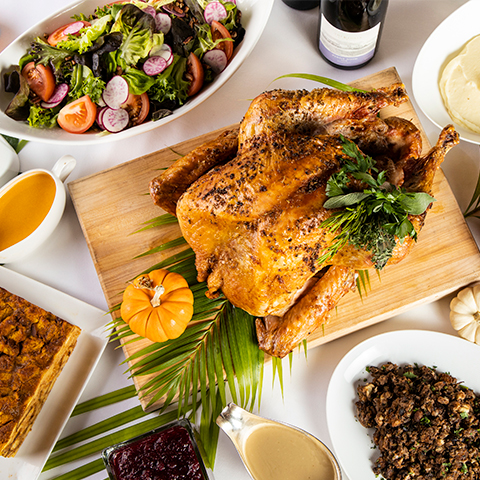 a turkey and other dishes on a table